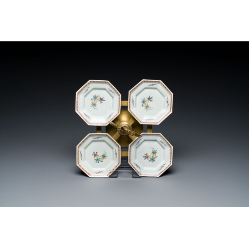 538 - Four Japanese Kakiemon-style octagonal dishes in a brass mount, Edo, 18th C.Description:Dim.: 23 x 2... 