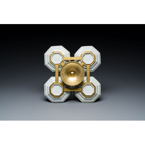 538 - Four Japanese Kakiemon-style octagonal dishes in a brass mount, Edo, 18th C.Description:Dim.: 23 x 2... 