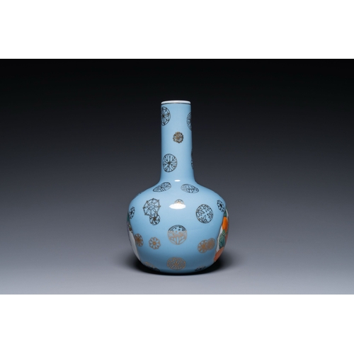 545 - A Chinese lavender blue-ground bottle vase with fruit medallions, RepublicDescription:H.: 30,5 cmCon... 