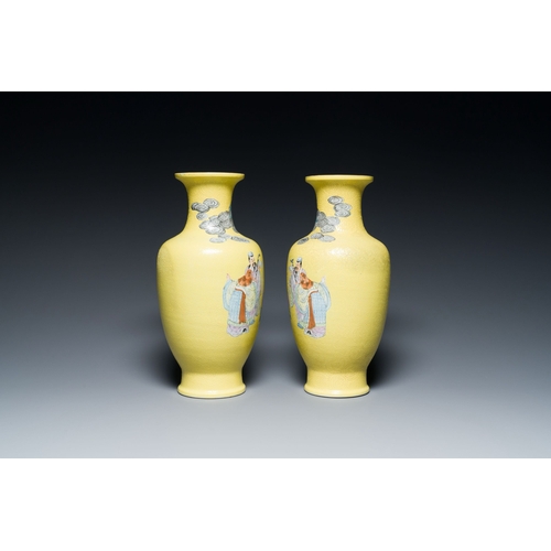 546 - A pair of Chinese famille rose yellow sgraffiato ground 'sages' vases, Qianlong mark, RepublicDescri... 