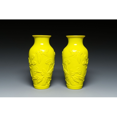 554 - A pair of Chinese yellow Beijing glass vases with butterflies among flowers, RepublicDescription:H.:... 