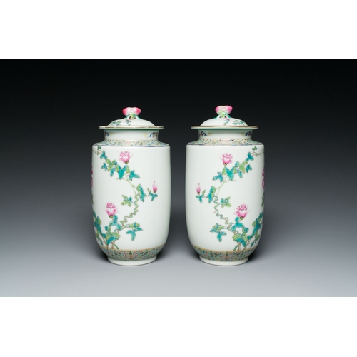 560 - A pair of Chinese famille rose vases and covers with floral design, Jiaqing mark, RepublicDescriptio... 