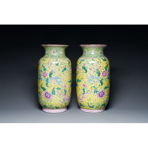 563 - A pair of Chinese famille rose yellow-ground 'dragon' vases, Qianlong mark, RepublicDescription:H.: ... 