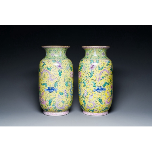 563 - A pair of Chinese famille rose yellow-ground 'dragon' vases, Qianlong mark, RepublicDescription:H.: ... 