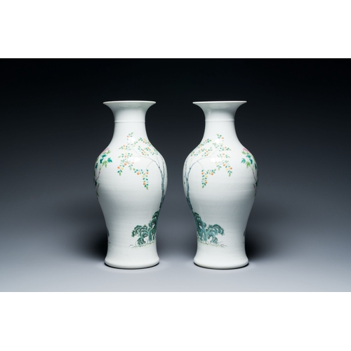 566 - A pair of Chinese famille rose 'playing boys' vases, Qianlong mark, RepublicDescription:H.: 44,5 cmC... 