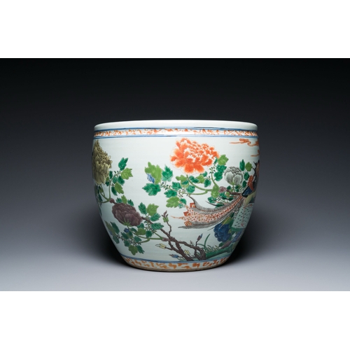 599 - A Chinese famille verte 'phoenixes' fish bowl, 19/20th C.Description:Dia.: 36,5 cm - H.: 31 cmCondit... 