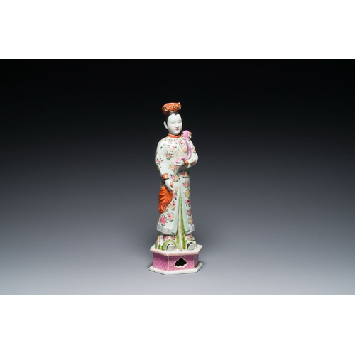 604 - A tall Chinese famille rose 'nodding head' figure, 19/20th C.Description:H.: 41 cmCondition reports:... 