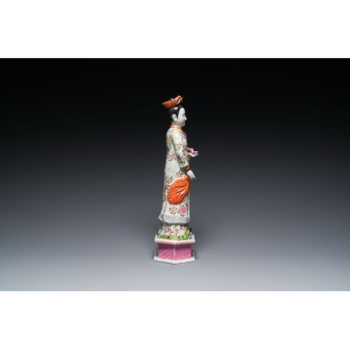 604 - A tall Chinese famille rose 'nodding head' figure, 19/20th C.Description:H.: 41 cmCondition reports:... 