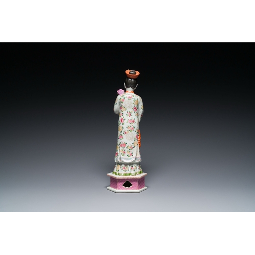 604 - A tall Chinese famille rose 'nodding head' figure, 19/20th C.Description:H.: 41 cmCondition reports:... 