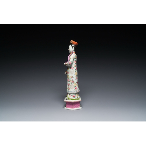 604 - A tall Chinese famille rose 'nodding head' figure, 19/20th C.Description:H.: 41 cmCondition reports:... 