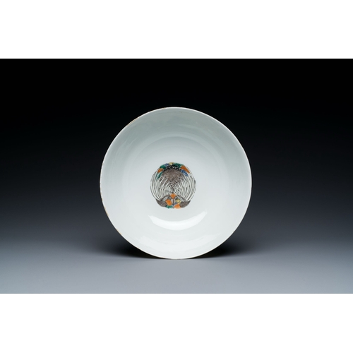 631 - A Chinese famille verte bowl with a bird and various insects, Guangxu mark, 19/20th C.Description:Di... 