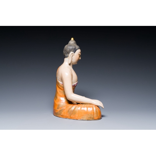 651 - A Chinese famille rose figure of Buddha, Qianlong mark, 19/20th C.Description:H.: 29 cmCondition rep... 