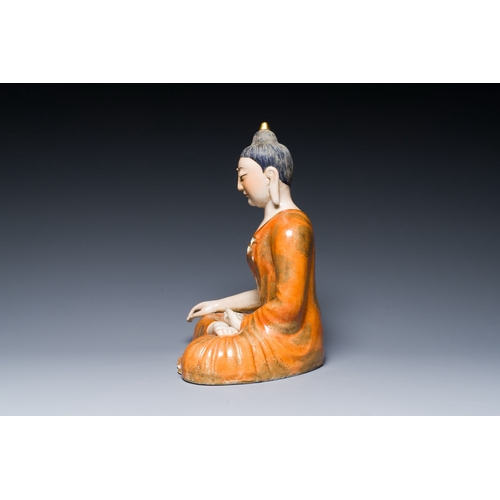 651 - A Chinese famille rose figure of Buddha, Qianlong mark, 19/20th C.Description:H.: 29 cmCondition rep... 