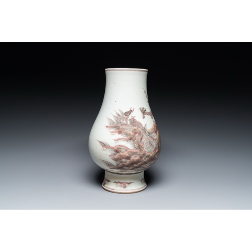 653 - A Chinese copper-red 'dragon and carp' vase, Kangxi mark, 20th C.Description:H.: 30 cm Provenance:- ... 