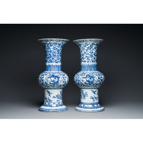 660 - A pair of Chinese blue and white 'gu' vases, Qianlong mark, RepublicDescription:H.: 57 cmCondition r... 