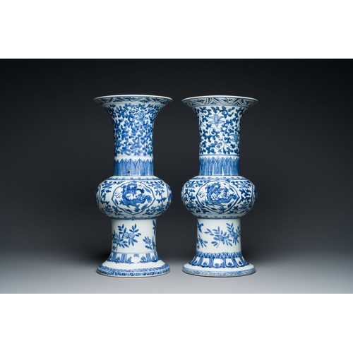 660 - A pair of Chinese blue and white 'gu' vases, Qianlong mark, RepublicDescription:H.: 57 cmCondition r... 