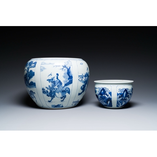 663 - Two Chinese blue and white fish bowls or jardinieres with figurative design and mythical animals, 19... 