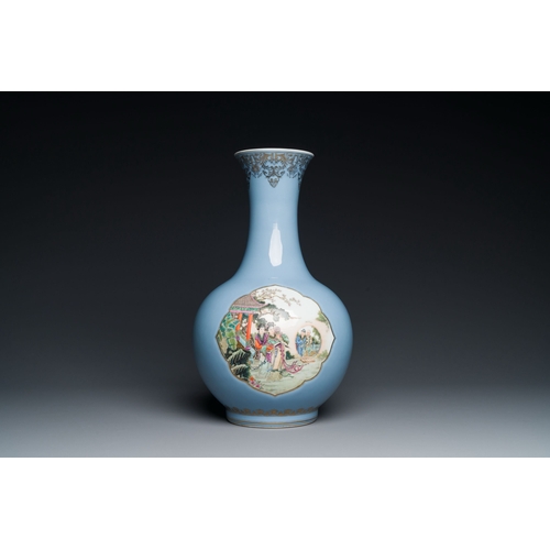 666 - A Chinese famille rose lavender-blue-ground bottle vase, Qianlong mark, RepublicDescription:H.: 40,5... 