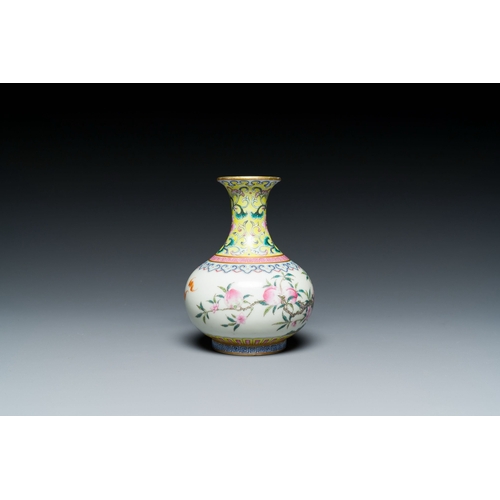 667 - A small Chinese famille rose 'nine peaches' bottle vase, Jiaqing mark, 20th C.Description:H.: 12 cmC... 