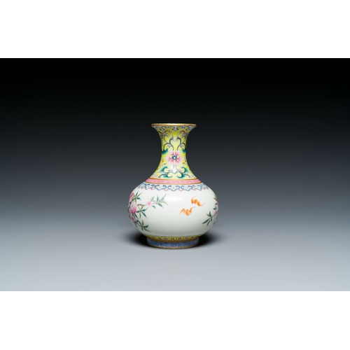 667 - A small Chinese famille rose 'nine peaches' bottle vase, Jiaqing mark, 20th C.Description:H.: 12 cmC... 