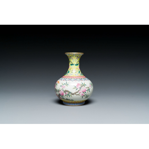 667 - A small Chinese famille rose 'nine peaches' bottle vase, Jiaqing mark, 20th C.Description:H.: 12 cmC... 