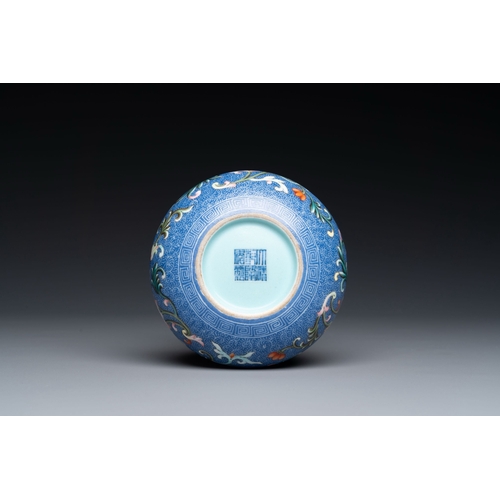 668 - A Chinese blue-sgraffito-ground famille rose water pot, Qianlong mark, RepublicDescription:Dia.: 9,5... 