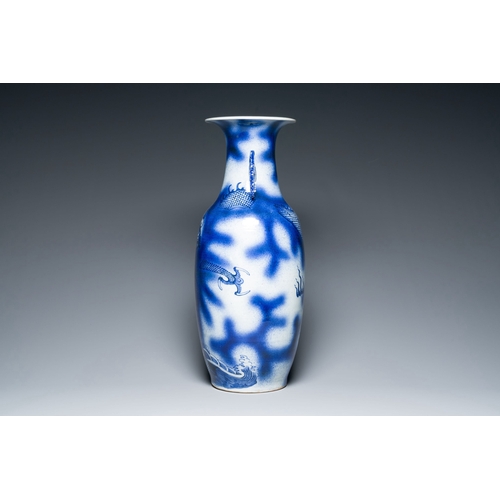 696 - A Chinese blue and white 'dragon and carp' vase, 19th C.Description:H.: 59 cmCondition reports:Pleas... 