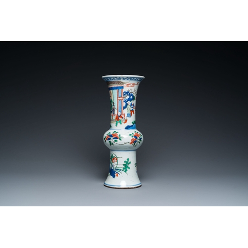 700 - A Chinese wucai 'gu' vase with narrative design, 19th C.Description:H.: 36 cmCondition reports:Pleas... 