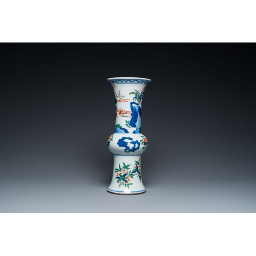 700 - A Chinese wucai 'gu' vase with narrative design, 19th C.Description:H.: 36 cmCondition reports:Pleas... 