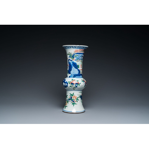 700 - A Chinese wucai 'gu' vase with narrative design, 19th C.Description:H.: 36 cmCondition reports:Pleas... 