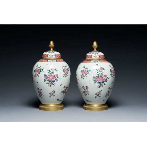 710 - A pair of famille rose-style gilt-bronze-mounted jars and covers, Samson, Paris, 19th C.Description:... 