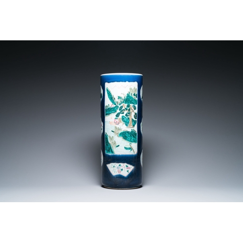 712 - A large Chinese blue-ground famille rose cylindrical vase, 19th C.Description:H.: 61,5 cmCondition r... 