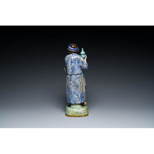 715 - A large Chinese polychrome Shiwan pottery figure of Li Tieguai, 19th C.Description:H.: 41 cmConditio... 