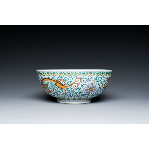 719 - A Chinese doucai 'dragons' bowl, Jiaqing mark, 19th C.Description:Dia.: 20,5 - H.: 8,5 cm Provenance... 