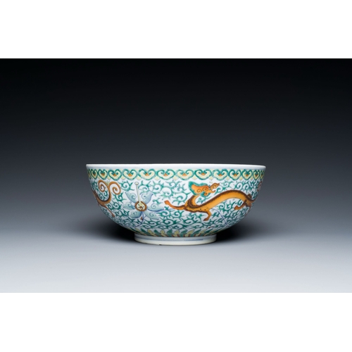 719 - A Chinese doucai 'dragons' bowl, Jiaqing mark, 19th C.Description:Dia.: 20,5 - H.: 8,5 cm Provenance... 