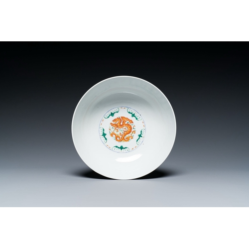 719 - A Chinese doucai 'dragons' bowl, Jiaqing mark, 19th C.Description:Dia.: 20,5 - H.: 8,5 cm Provenance... 