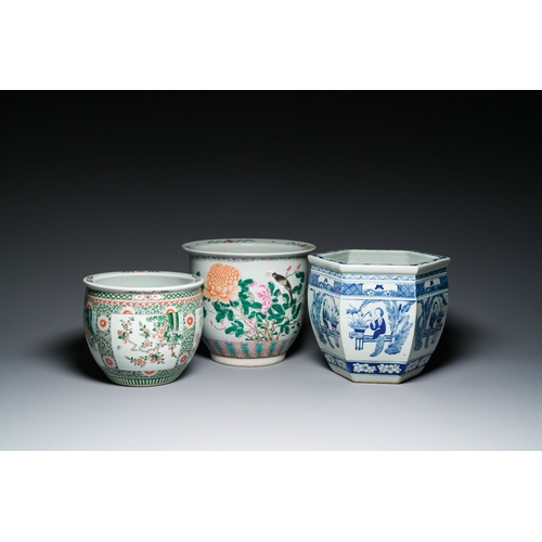 721 - Three Chinese blue and white, famille rose and famille verte fish bowls and jardinieres, 19th C.Desc... 