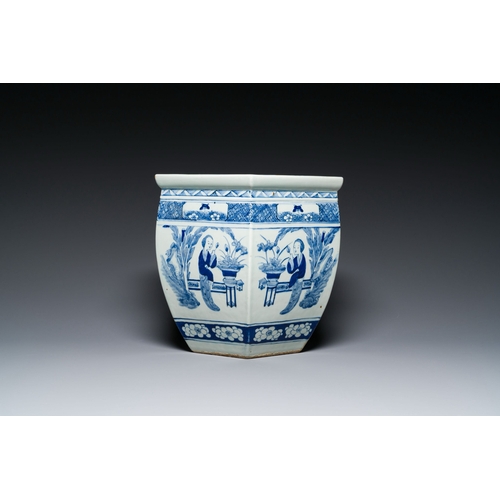 721 - Three Chinese blue and white, famille rose and famille verte fish bowls and jardinieres, 19th C.Desc... 