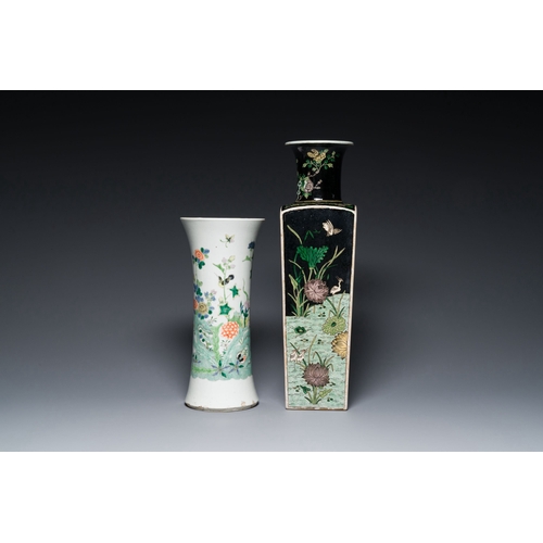 722 - A square Chinese famille noire vase and a famille verte 'gu' vase, Kangxi mark, 19th C.Description:H... 