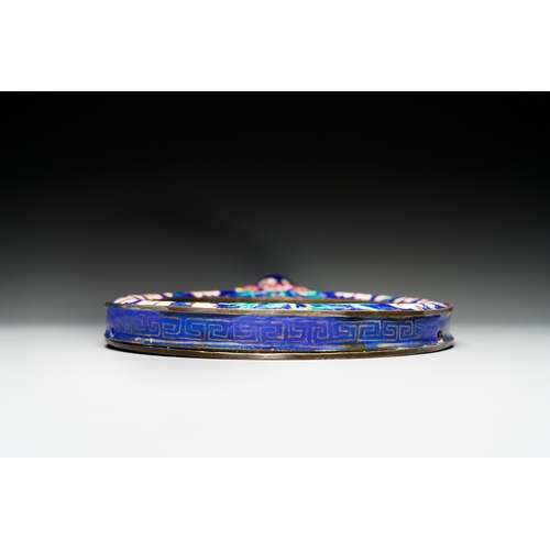 110 - A Chinese Canton enamel hand mirror, Qianlong/JiaqingDescription:L.: 37,5 cmCondition reports:Please... 