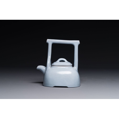 124 - A Chinese monochrome clair-de-lune-glazed Yixing stoneware teapot and cover, Yixing seal mark, Repub... 