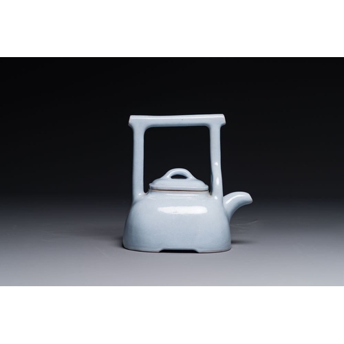 124 - A Chinese monochrome clair-de-lune-glazed Yixing stoneware teapot and cover, Yixing seal mark, Repub... 