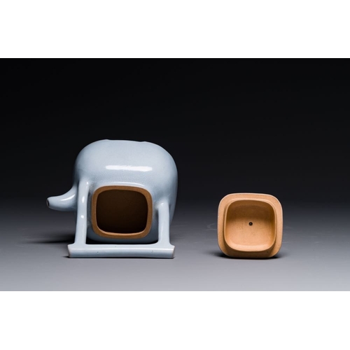 124 - A Chinese monochrome clair-de-lune-glazed Yixing stoneware teapot and cover, Yixing seal mark, Repub... 