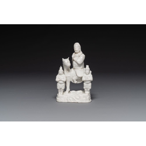142 - A Chinese Dehua blanc de Chine group of Guandi on horseback and two attendants, KangxiH.: 20,5 cm 
 ... 