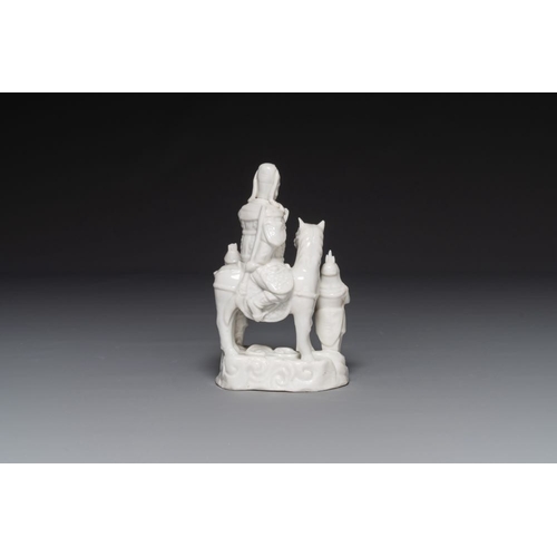 142 - A Chinese Dehua blanc de Chine group of Guandi on horseback and two attendants, KangxiH.: 20,5 cm 
 ... 