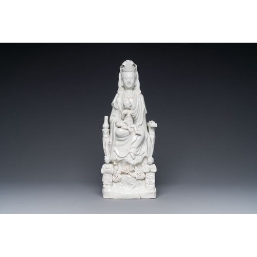 143 - A Chinese Dehua blanc de Chine group of Guanyin with a child and servants, 18th C.H.: 38 cm
 
 Prove... 