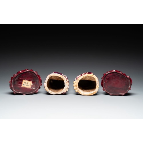 149 - A pair of Chinese flambe-glazed models of peacocks on wooden stands, 19th C.H.: 45,5 cm (incl. stand... 