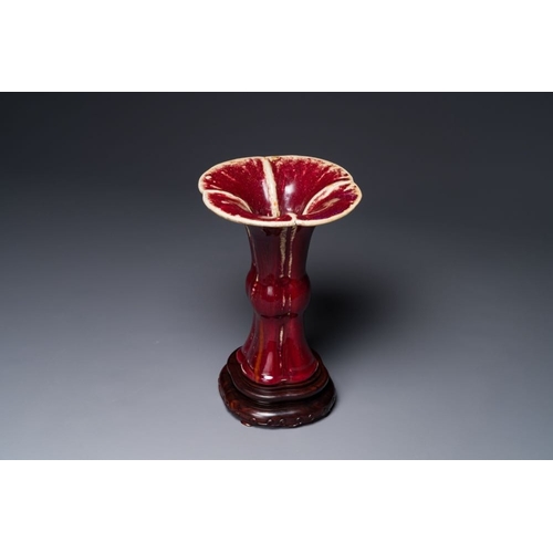 150 - A Chinese quadrifoil flambe-glazed 'zun' vase, Qianlong mark and of the periodH.: 33 cm (incl. stand... 