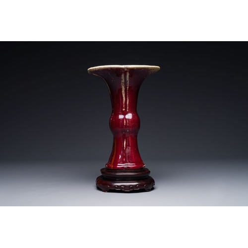 150 - A Chinese quadrifoil flambe-glazed 'zun' vase, Qianlong mark and of the periodH.: 33 cm (incl. stand... 