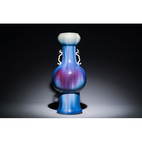 153 - A Chinese flambe-glazed garlic-mouth vase with ruyi handles, 19th C.H.: 57 cm
 Provenance: The colle... 